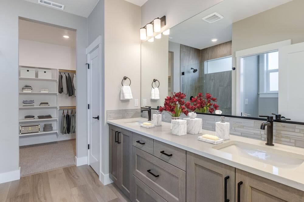 Primary bath. Sample photo, specs, design selections, and standards vary. Upgrades present.