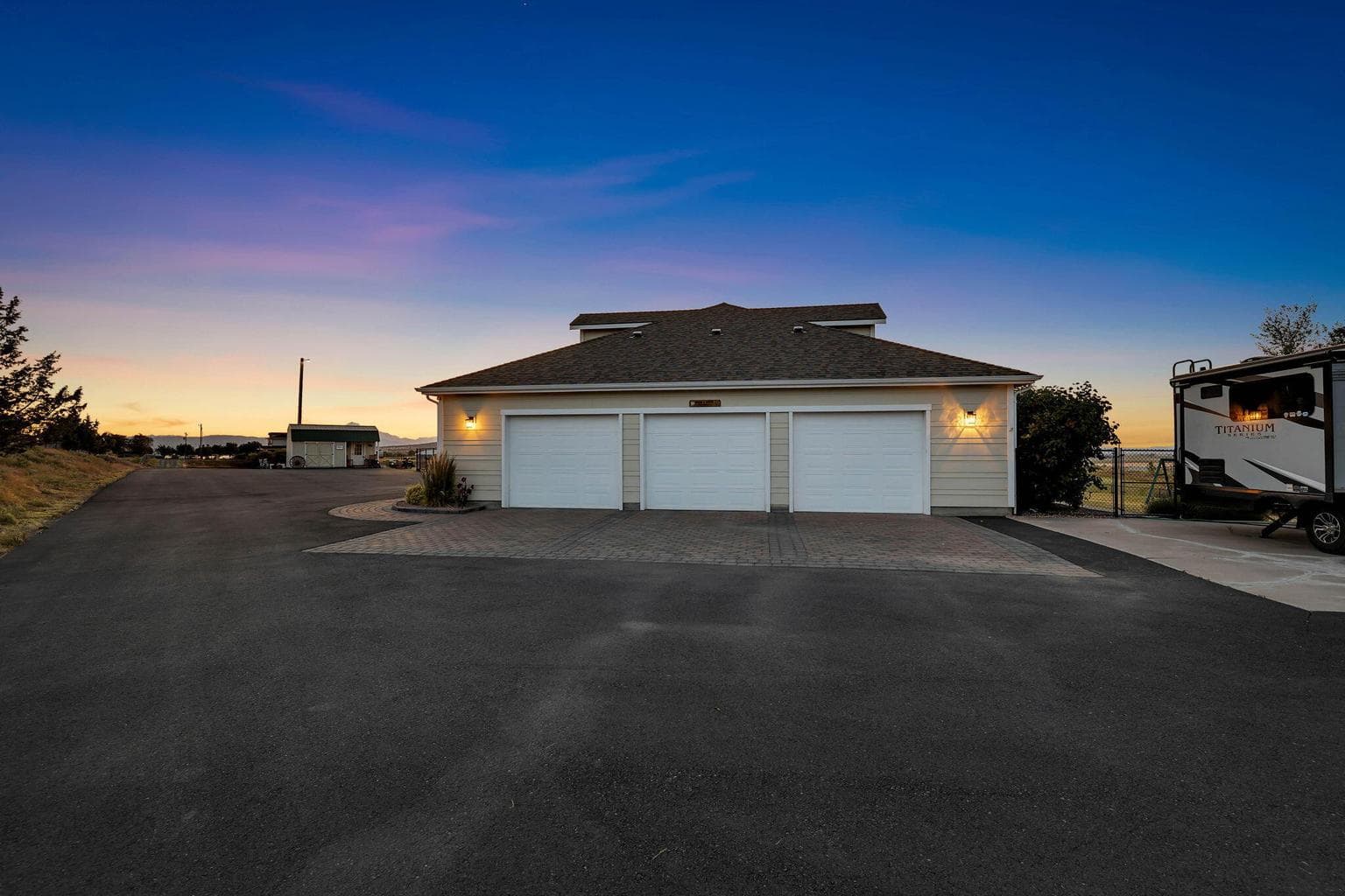 Three car garage with sauna.