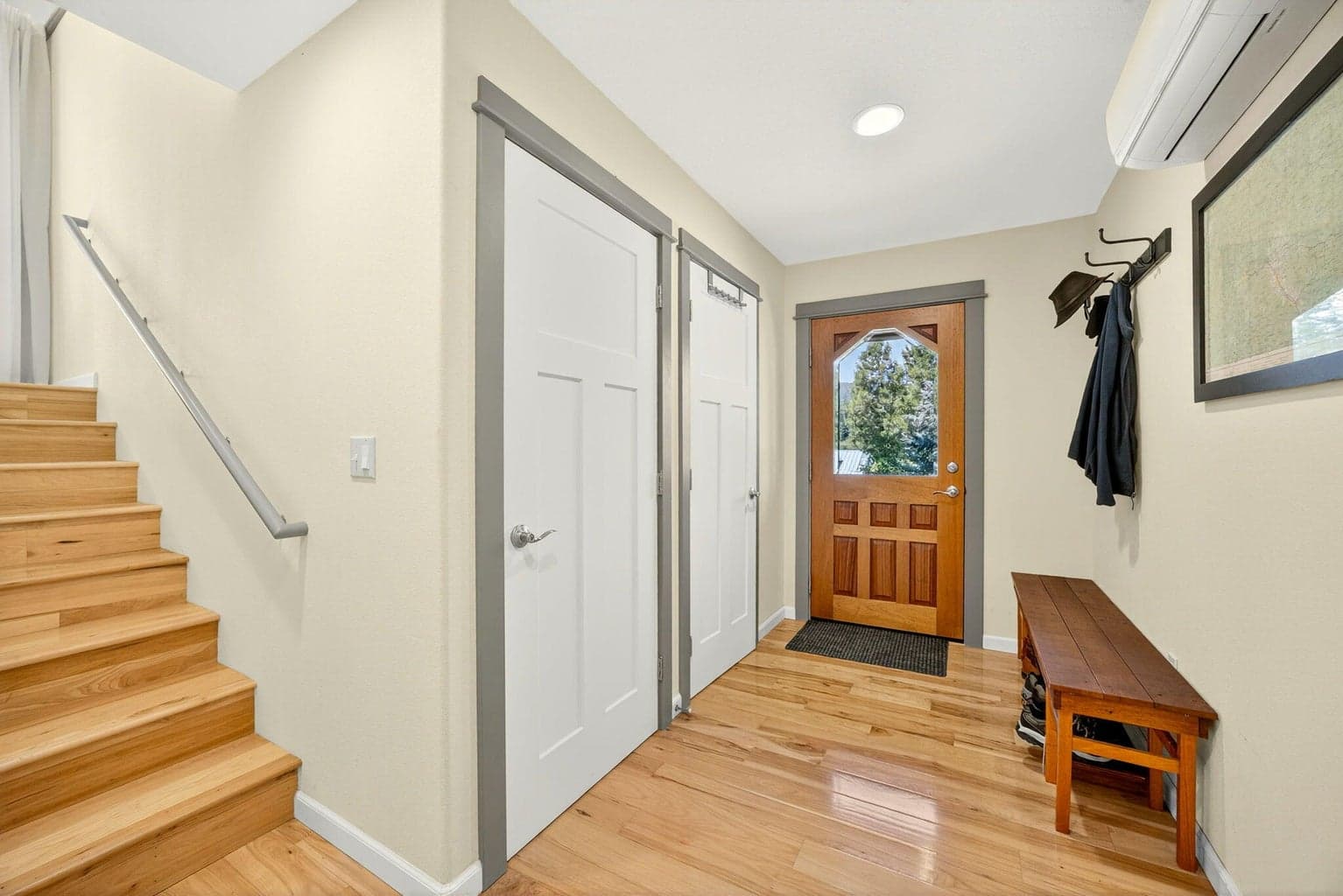 Front entry has plenty of room to take off your shoes after a hike on the adjacent public trails system