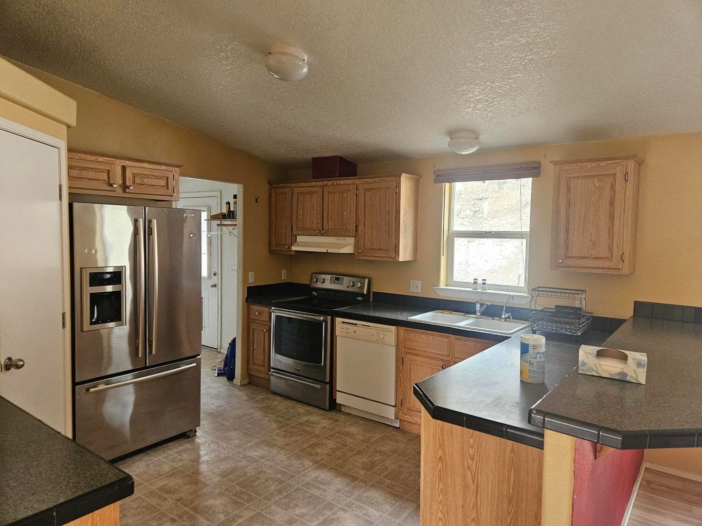 Stainless steel newer refrigerator included