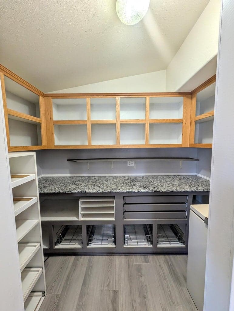 Walk in pantry with loads of storage.