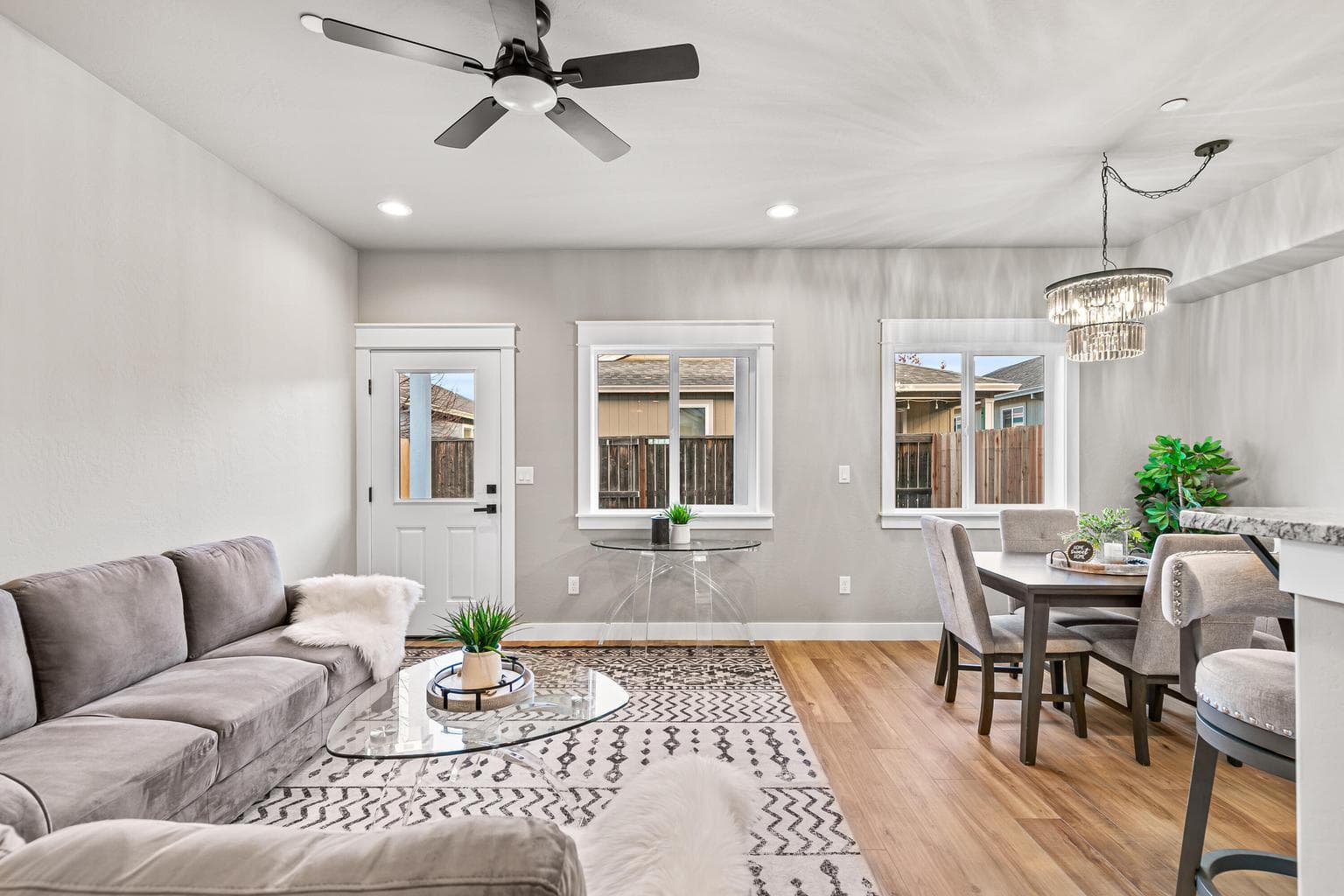 Spacious open floor plan with ceiling fan