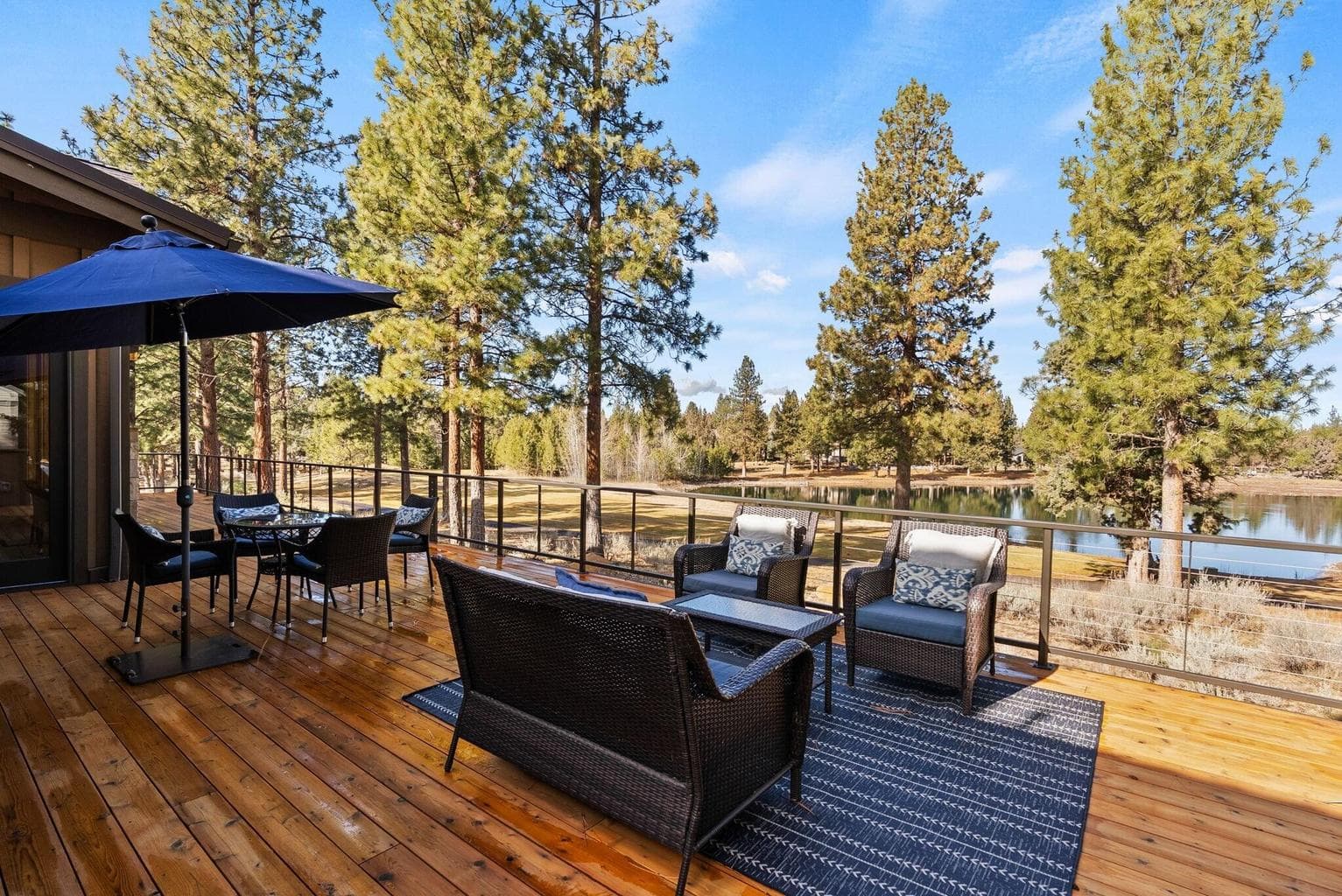 Elevated outdoor living with sweeping lake and fairway vistas in the heart of Aspen Lakes Golf Course Estates.
