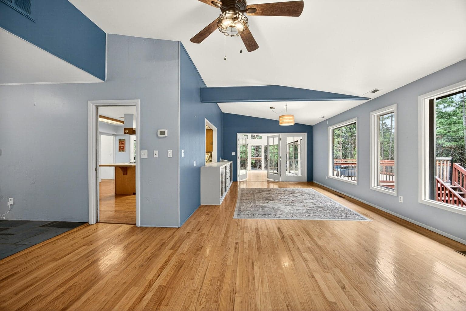 Hardwood floors throughout living area.