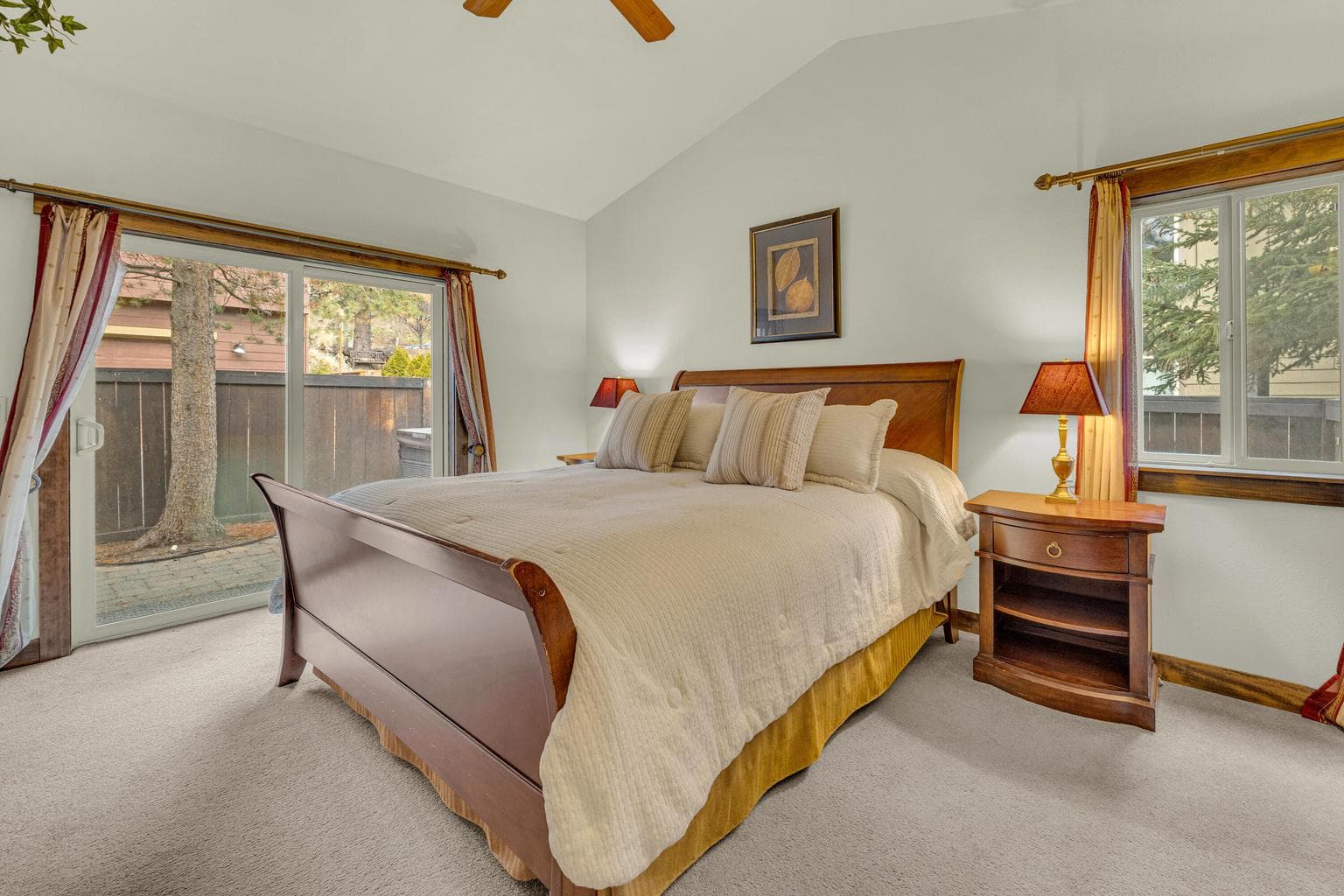 Main Level Primary Suite with patio access to hot tub