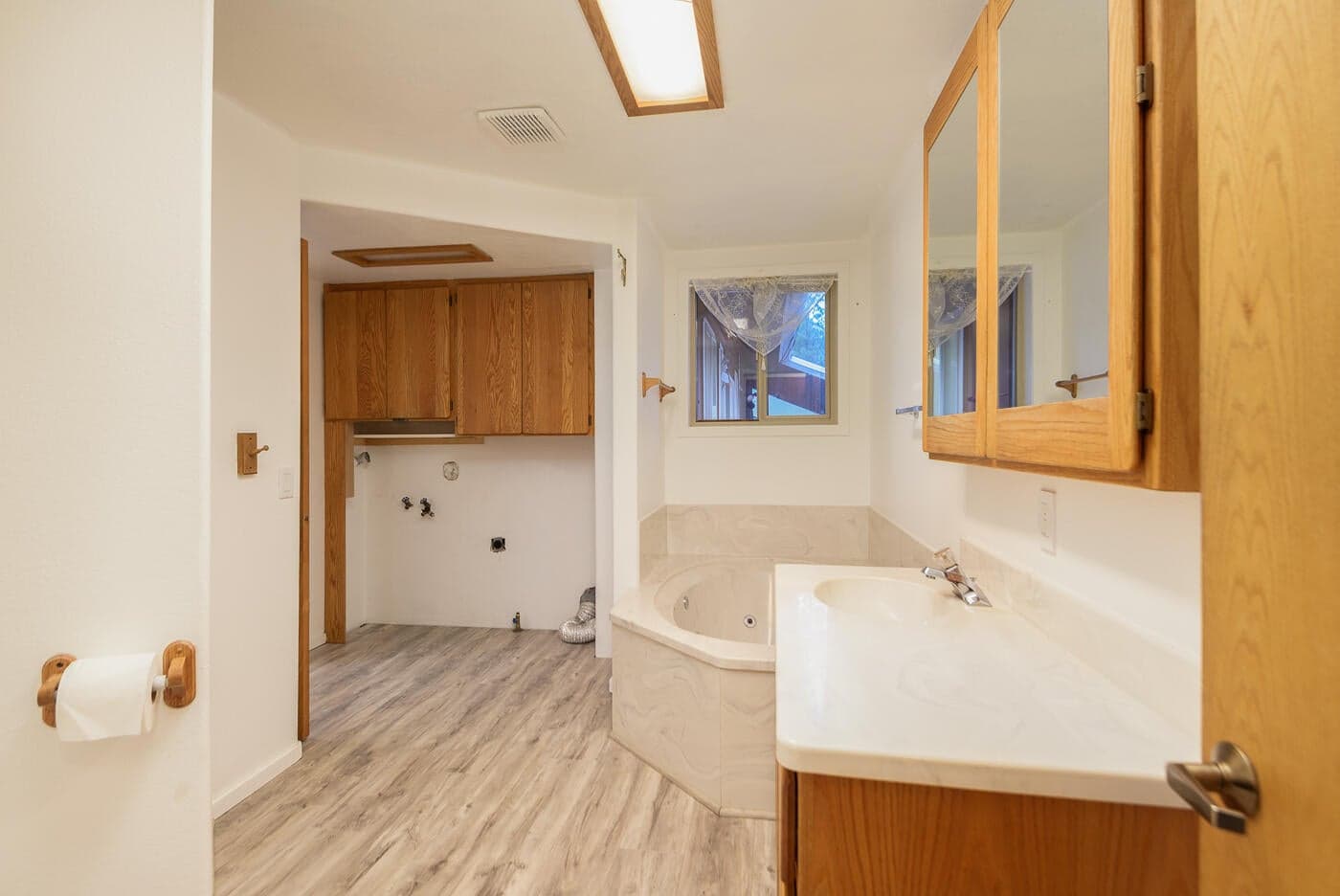 Bathroom with washer and dryer hook ups