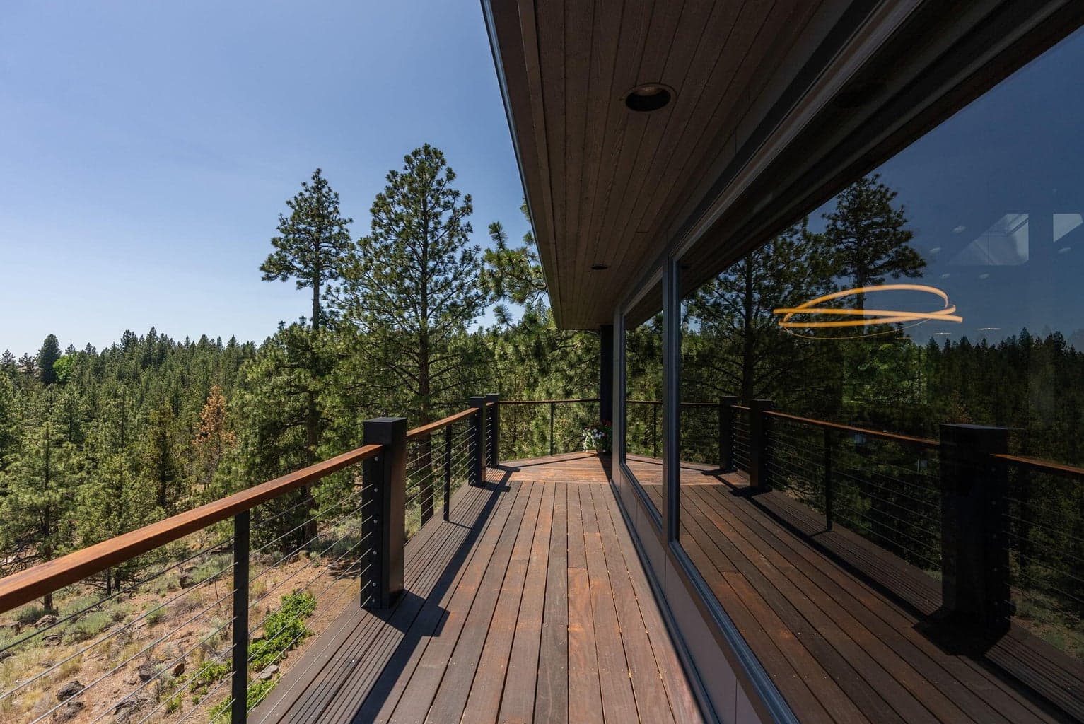 IPE wood decks with stainless steel cable railing for maximum views