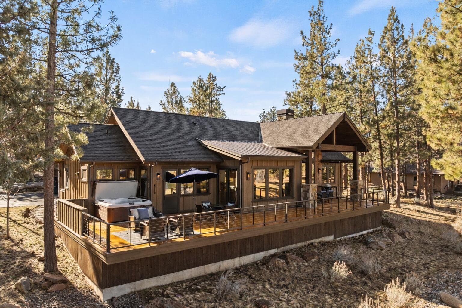 Elevated outdoor living with sweeping lake and fairway vistas in the heart of Aspen Lakes Golf Course Estates.