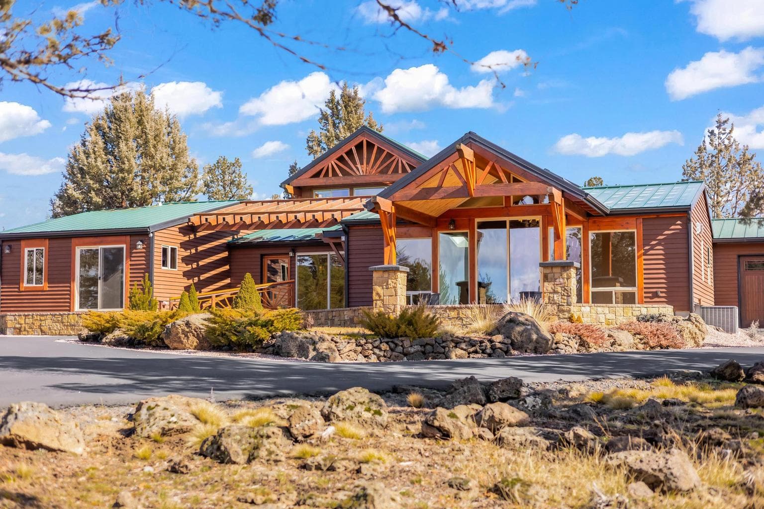 Privacy, paved gated driveway, mountain views, metal roof, cedar siding