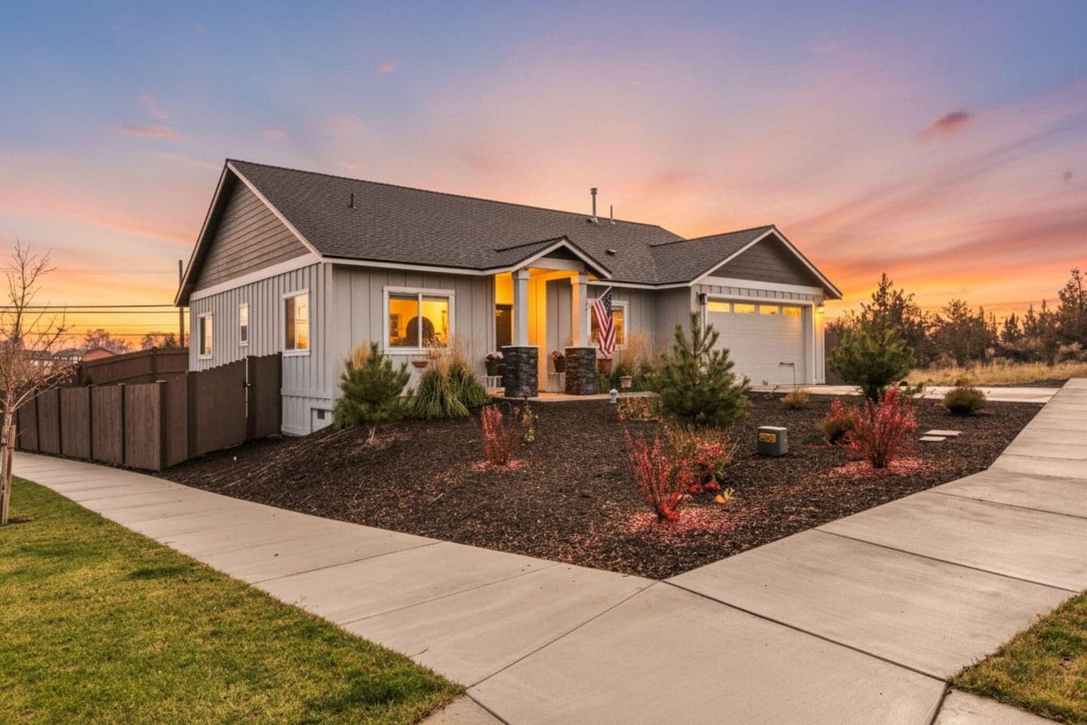 Front View of the corner lot w/a digitally edited Central Oregon Sunset