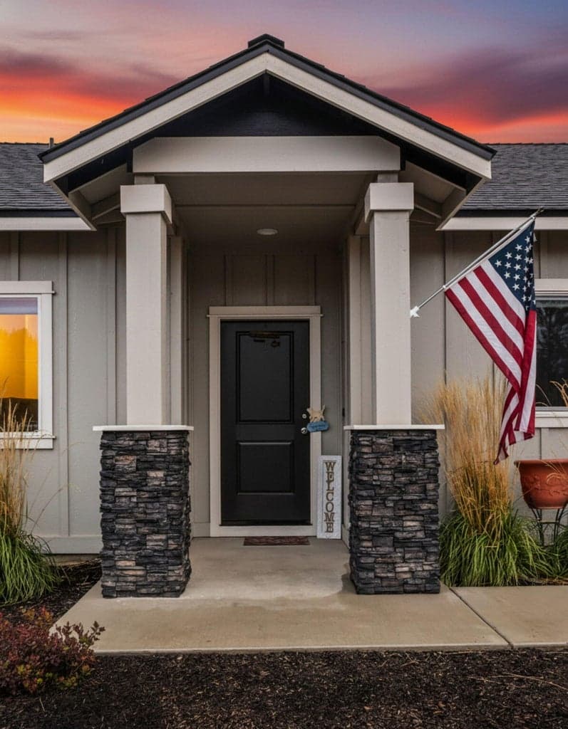 Front entry way with a digitally edited skyscape