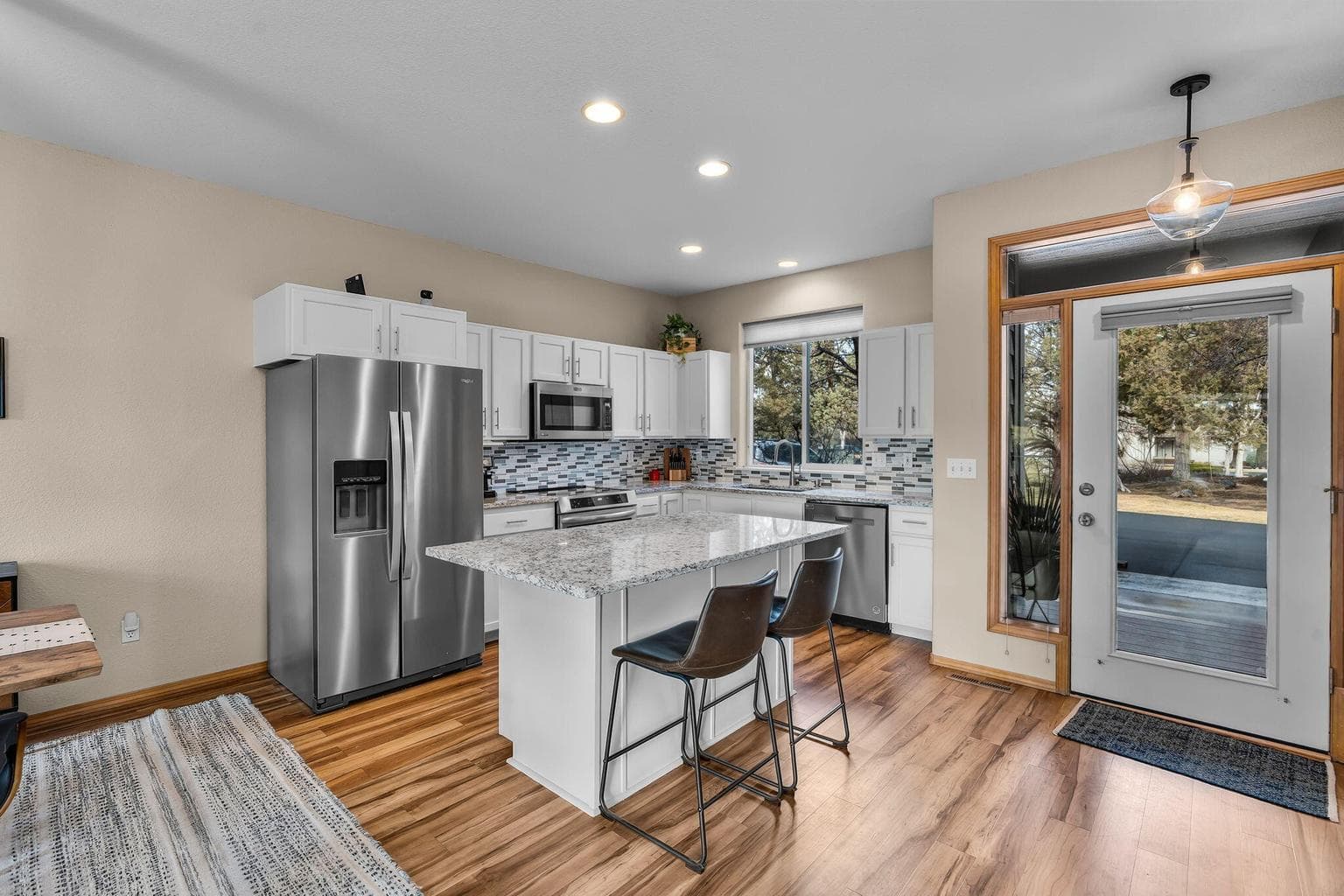 Open-concept living and dining spaces create a comfortable area for everyday living and entertaining.