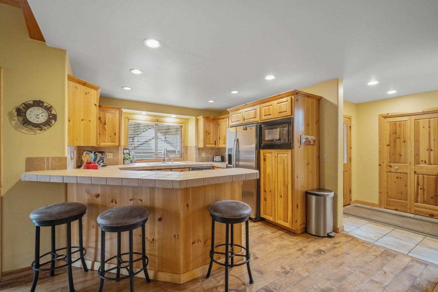 The open kitchen is the perfect gathering hub