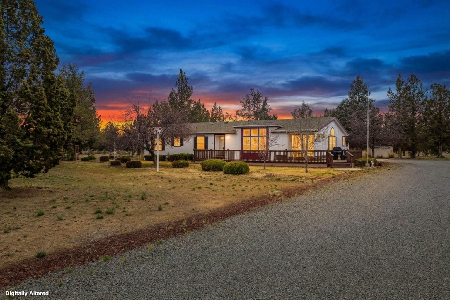 Alternate exterior angle showcasing entry and landscaping.