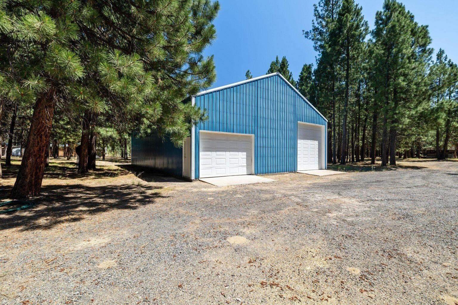 40x60 pole barn shop with boat/toy storage, workshop, heated/cooling