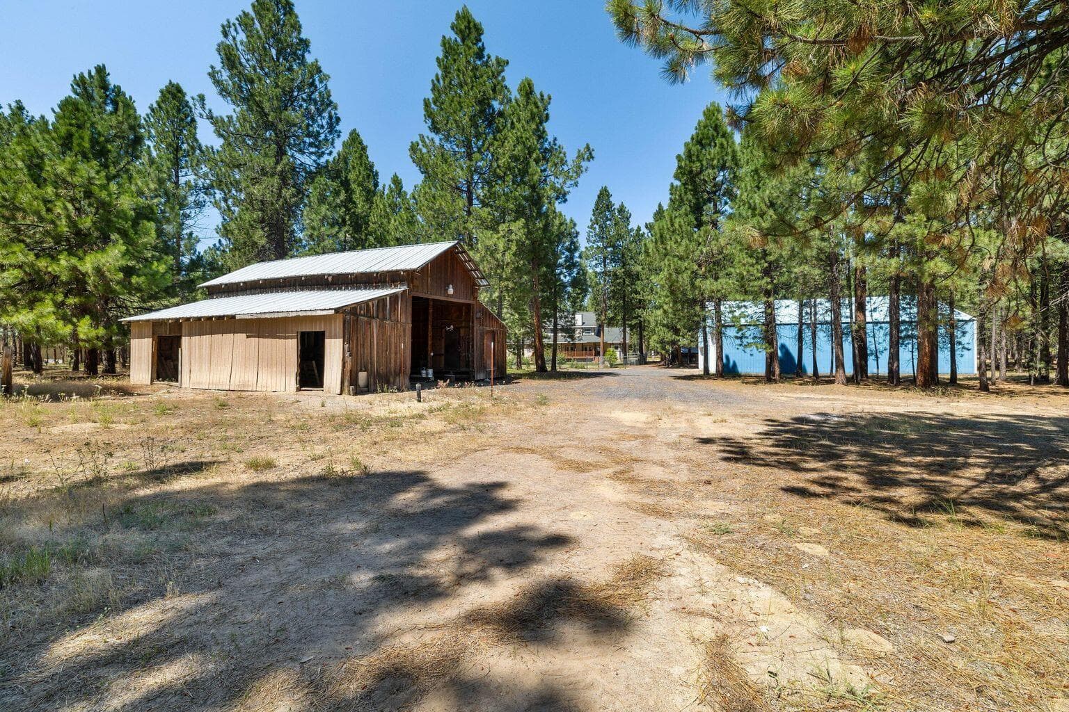 Horse barn and pole barn from back of property