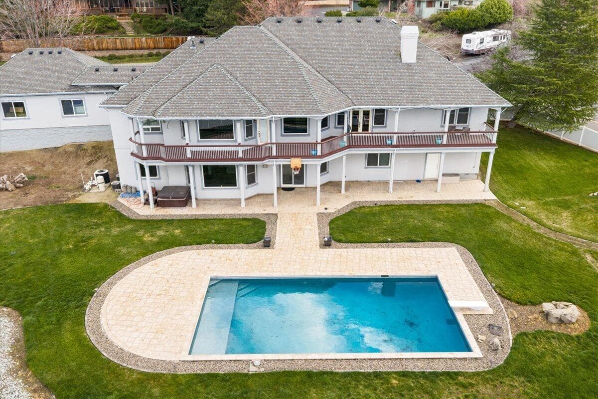 Resort style salt-water pool features brand new water pump