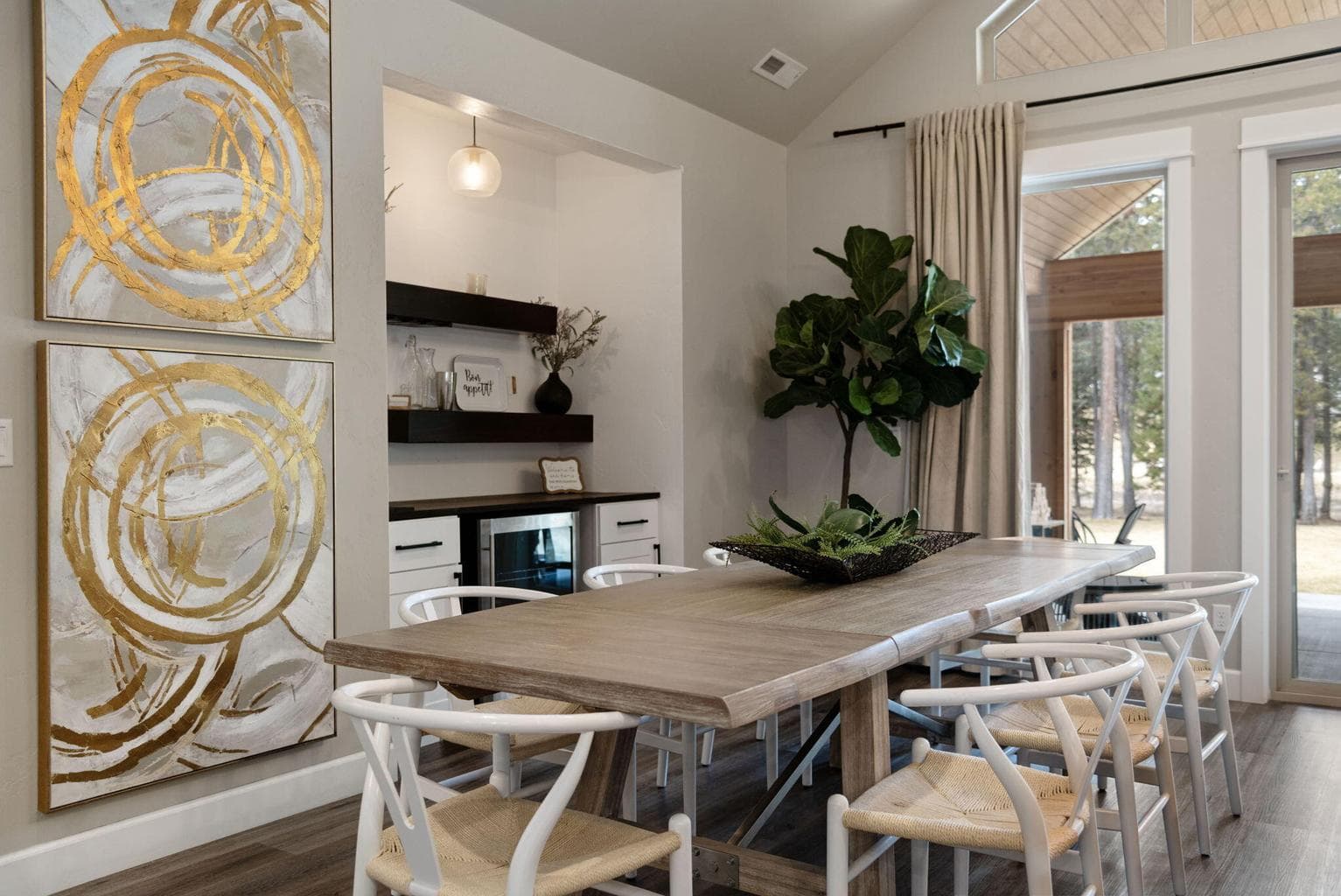 in the open living, dining and kitchen areas