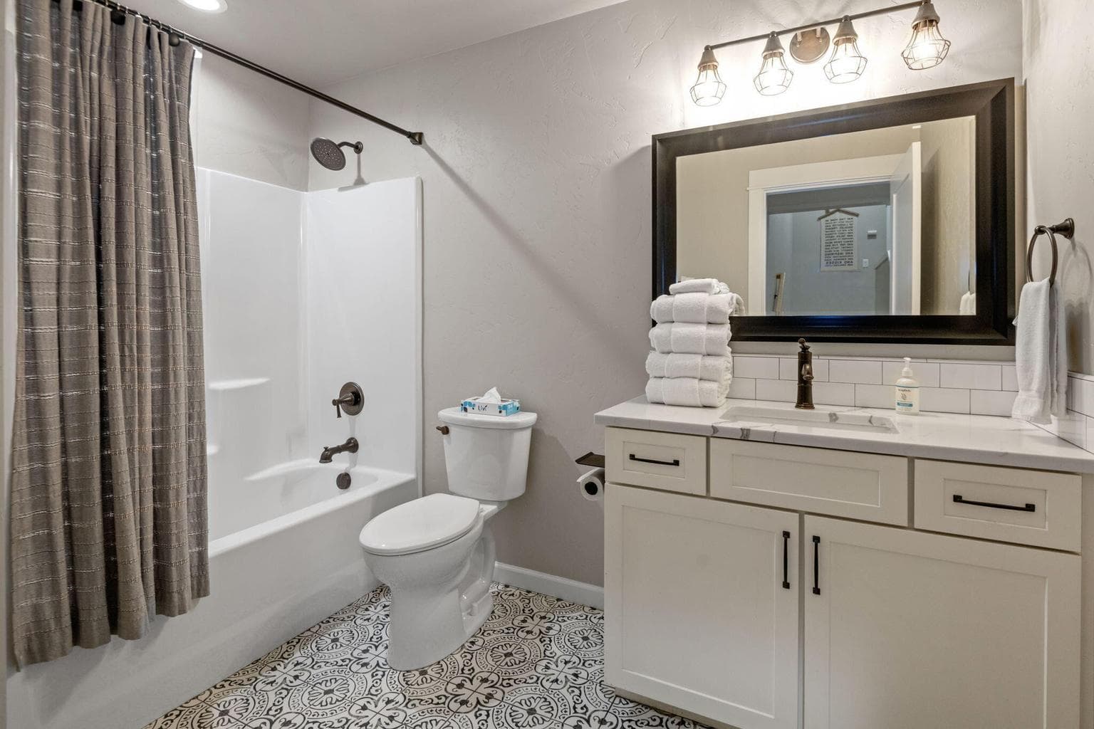 Beautifully tiled floors in the second primary bath