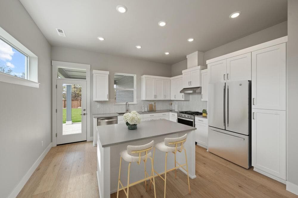 Kitchen. Photos have been virtually staged.