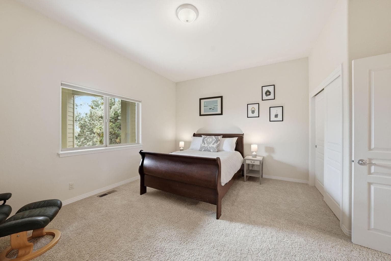2nd Primary bedroom is spacious, has 2 spacious closets & enjoys a view!