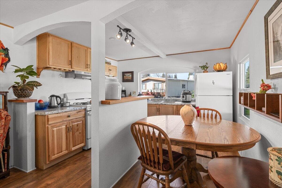 Kitchen and dining area enjoy abundant natural light.