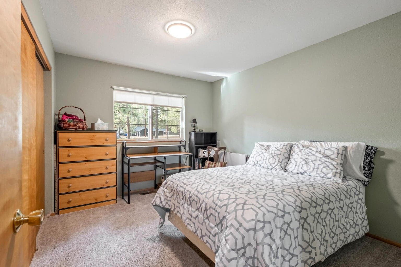 Guest room one - large enough for a queen bed to keep guests comfy.