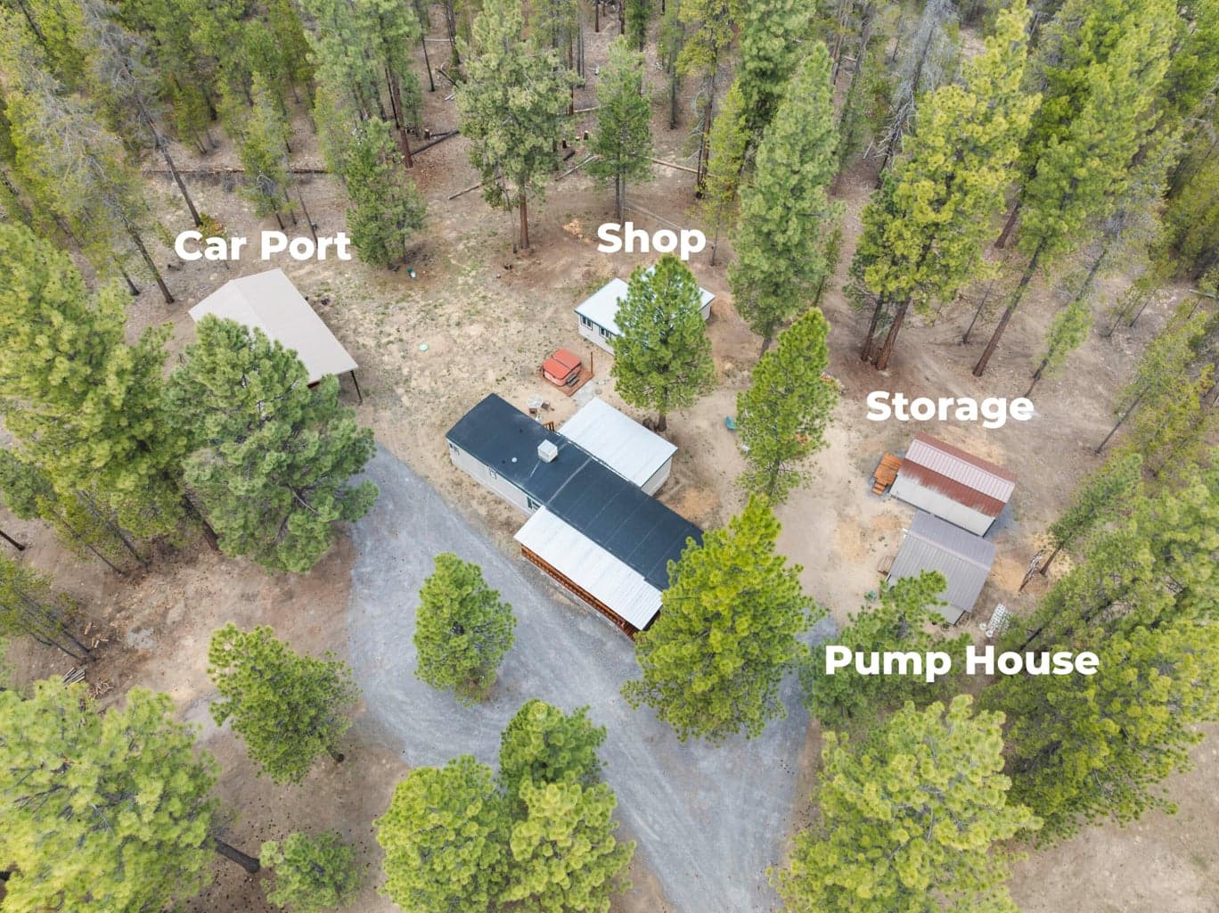 Aerial view of property with all buildings labeled