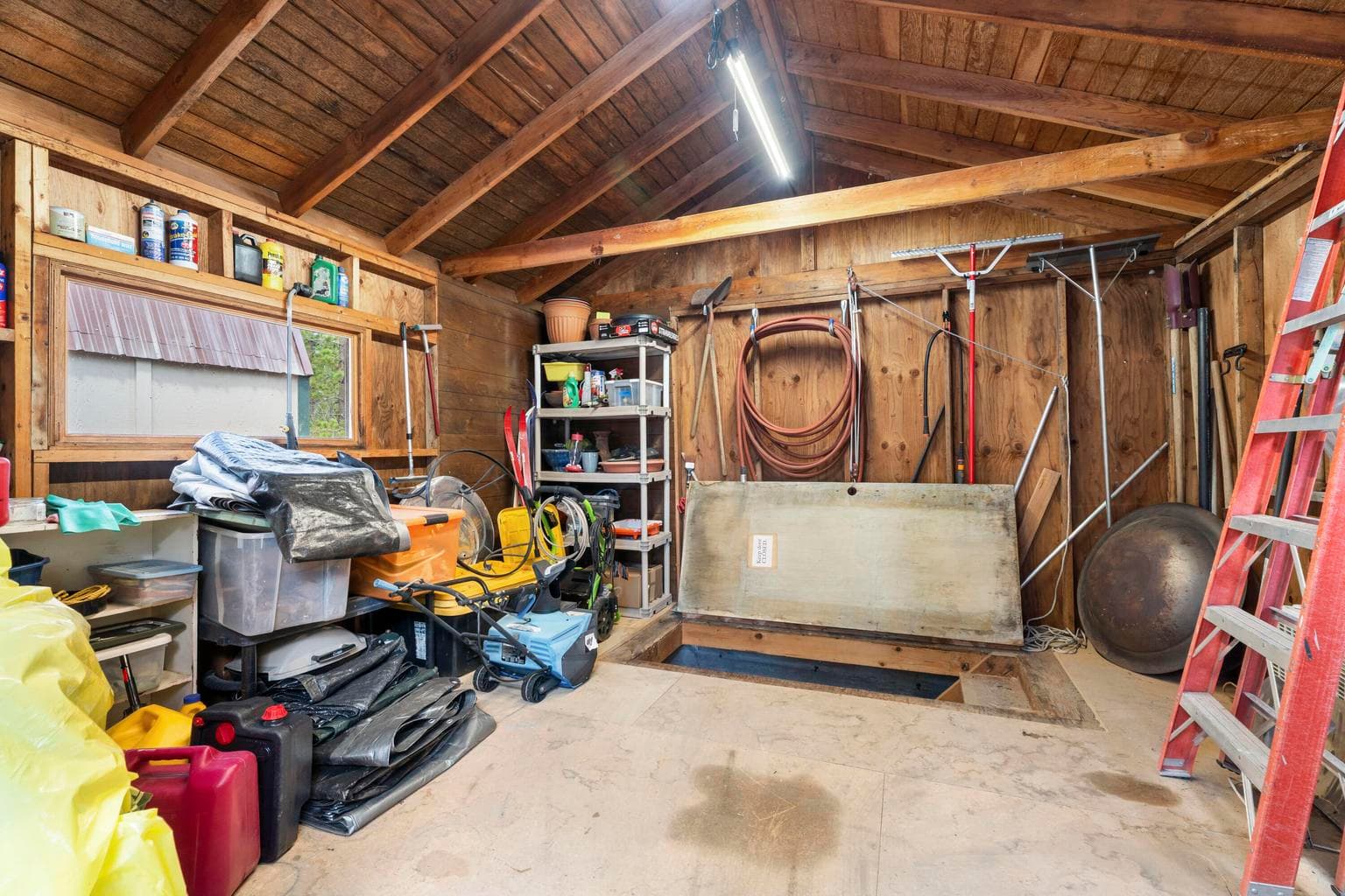 Pumphouse access in storage shed