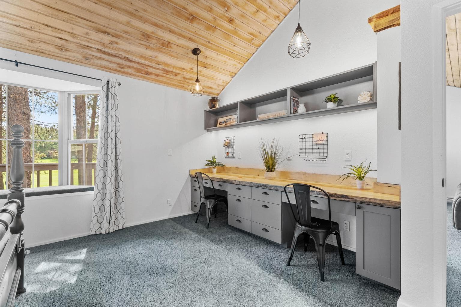 Primary bedroom offers a work area