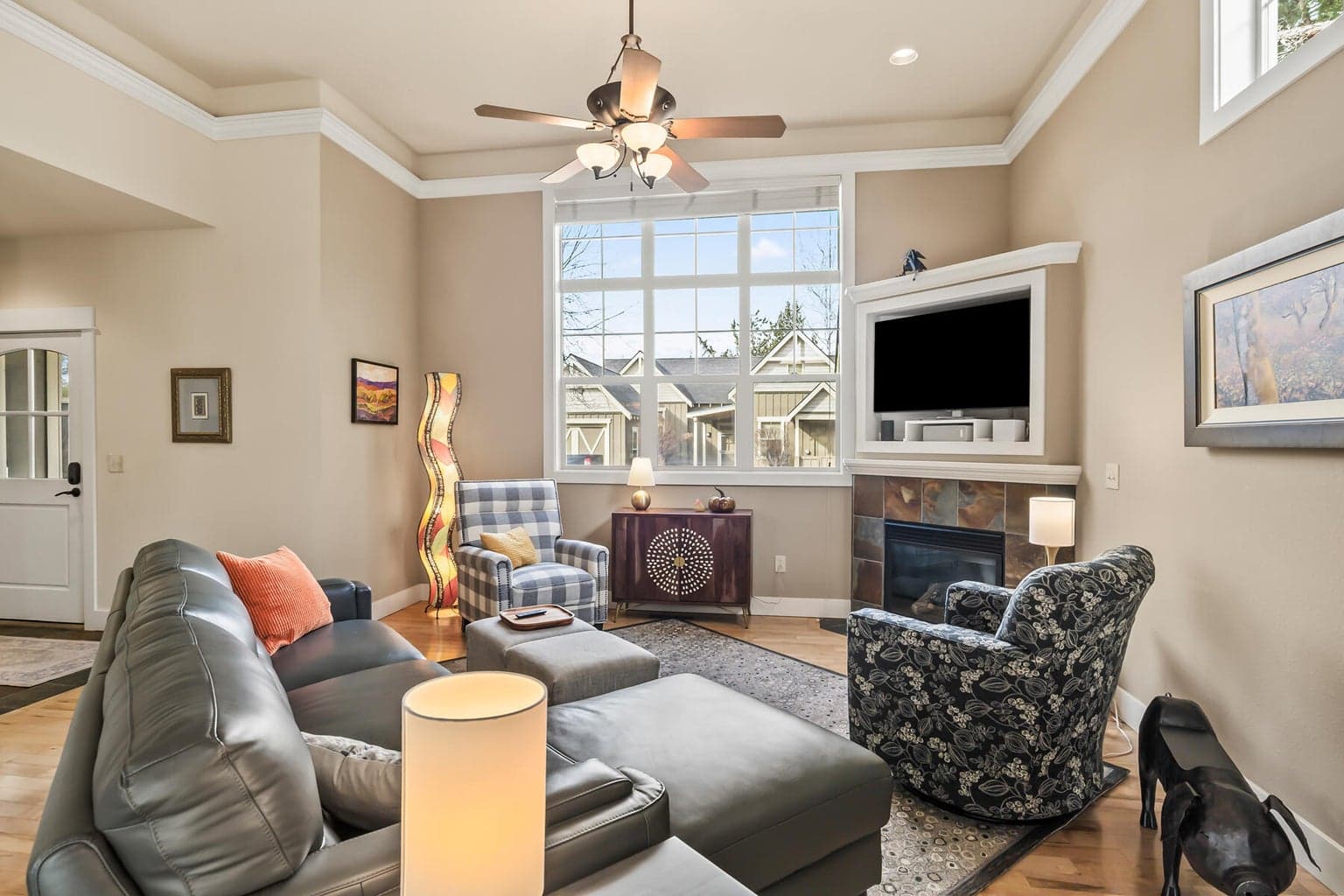 High ceilings, rich maple hardwood floors, and huge windows