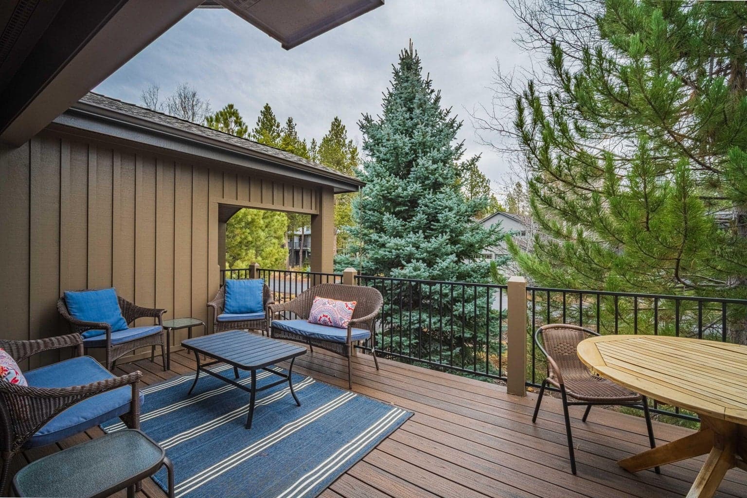 Enjoy delightful outdoor living w/ a hot tub & expansive Trex decking in the front and back.