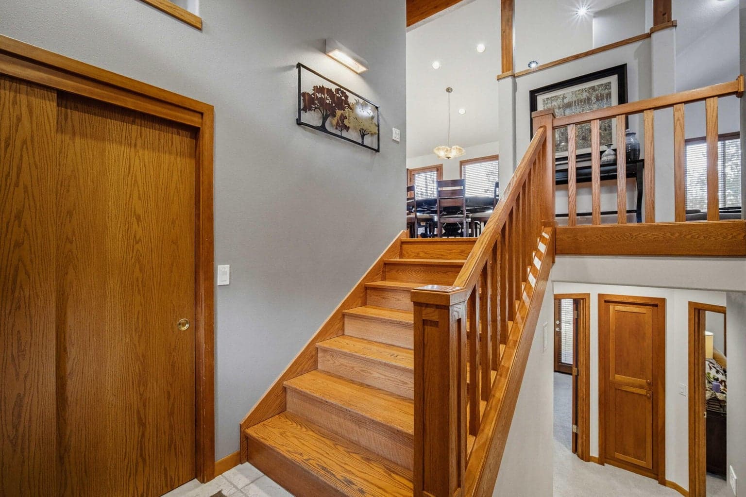 The layout provides separate spaces, both upstairs & downstairs.
