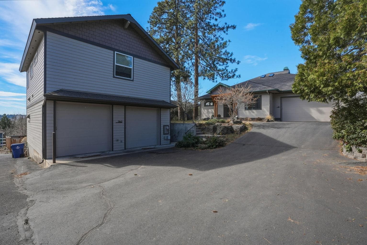 Single level main home, 780 SF ADU plus 4 Car garage. 2 Attached to main house, 1 for ADU and the 4th is set up for shop with heat and half bath!