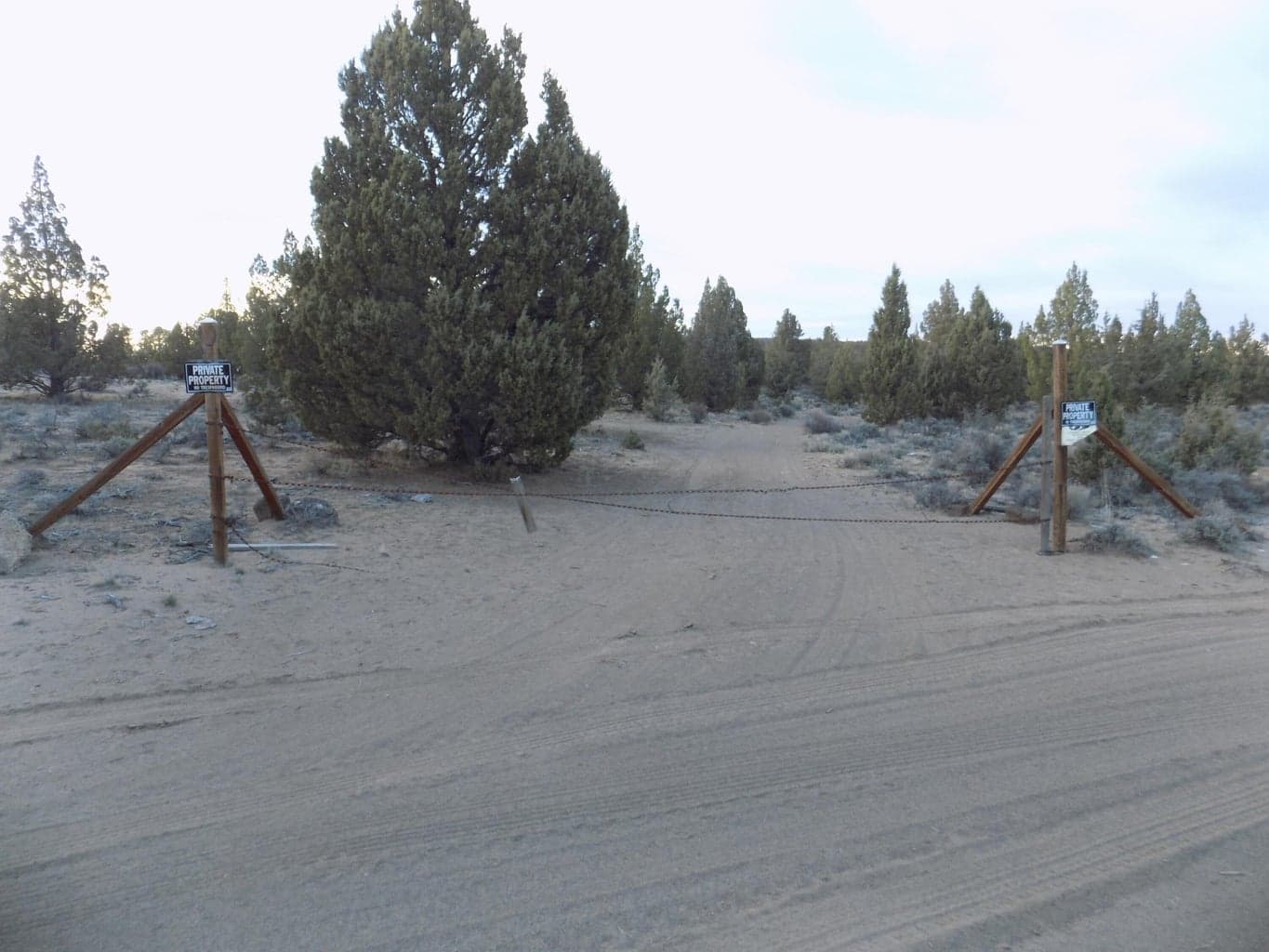 fenced, gated entrance to lot 1400.