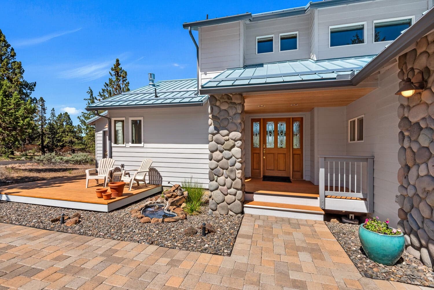 Entry w/east facing deck & water feature