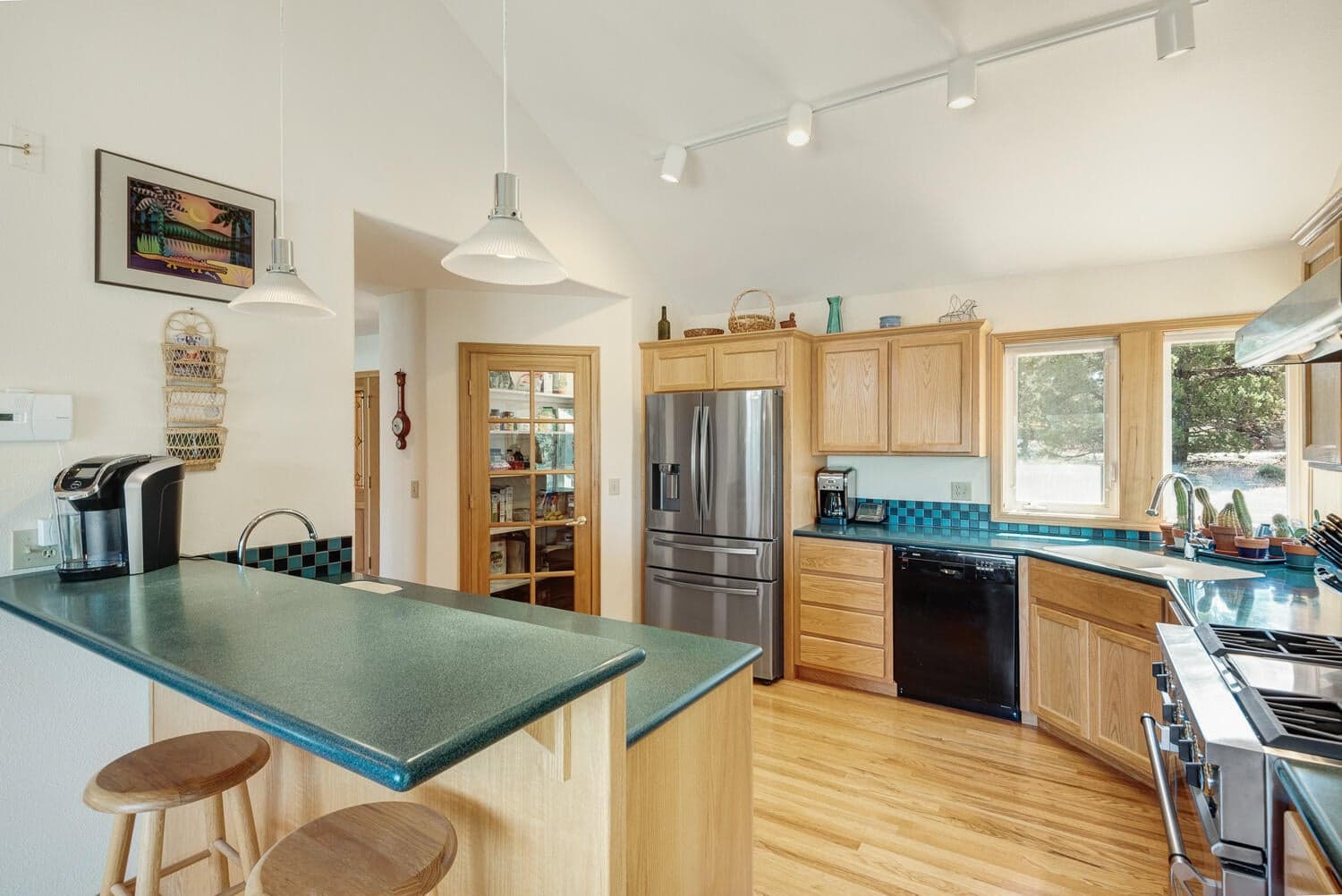 Kitchen w/ pantry and newer refrigerator