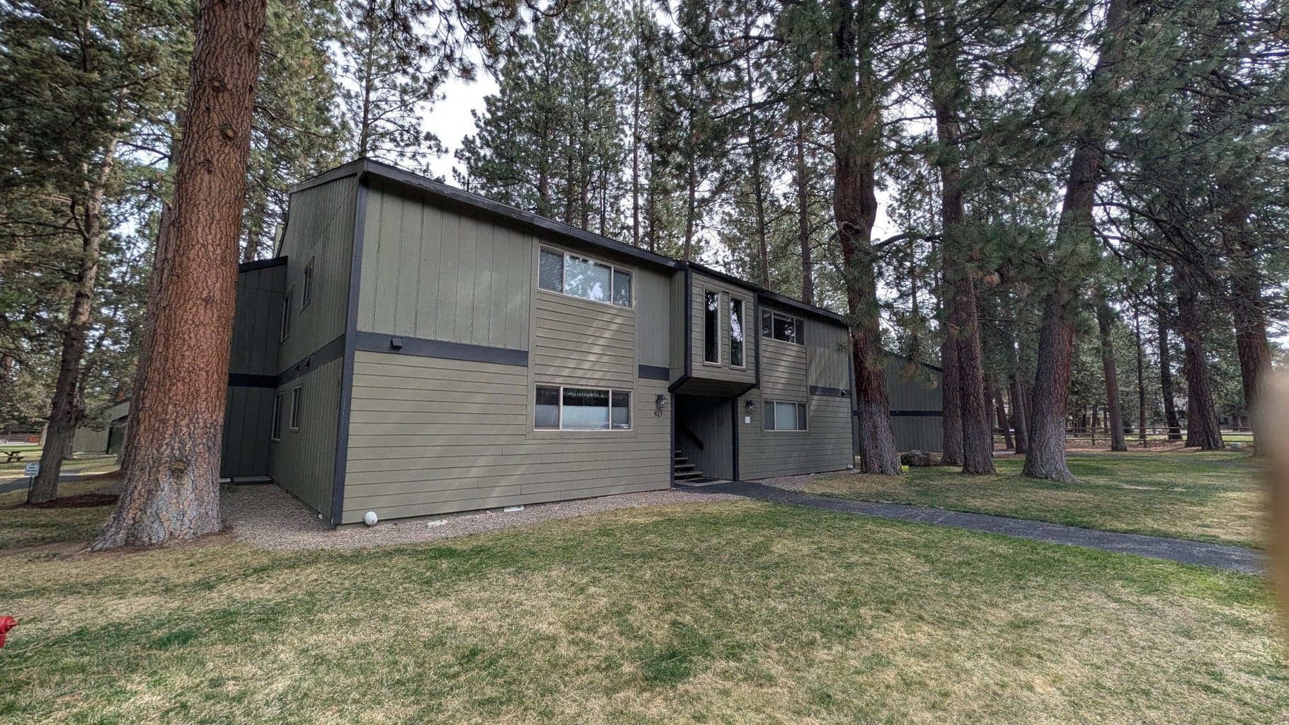 Main Level Corner Unit (far right) with Covered Fenced Deck