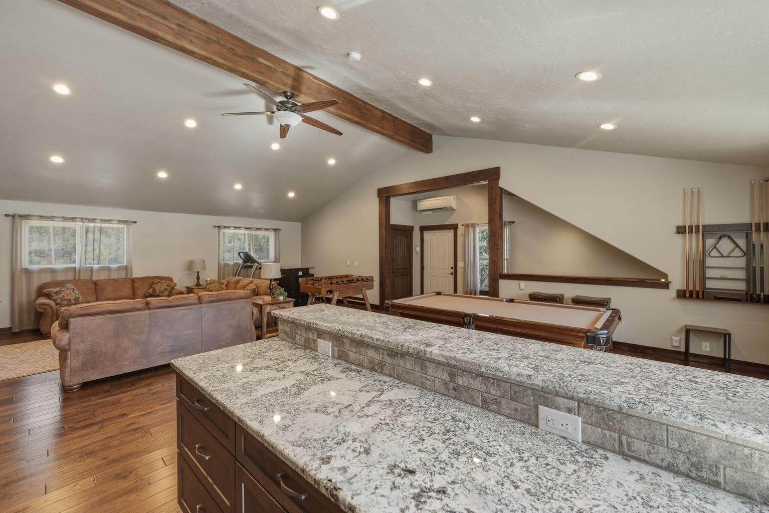 "ADU" space above garage w/ separate entrance. Engineered to add walls for bedrooms & laundry room.