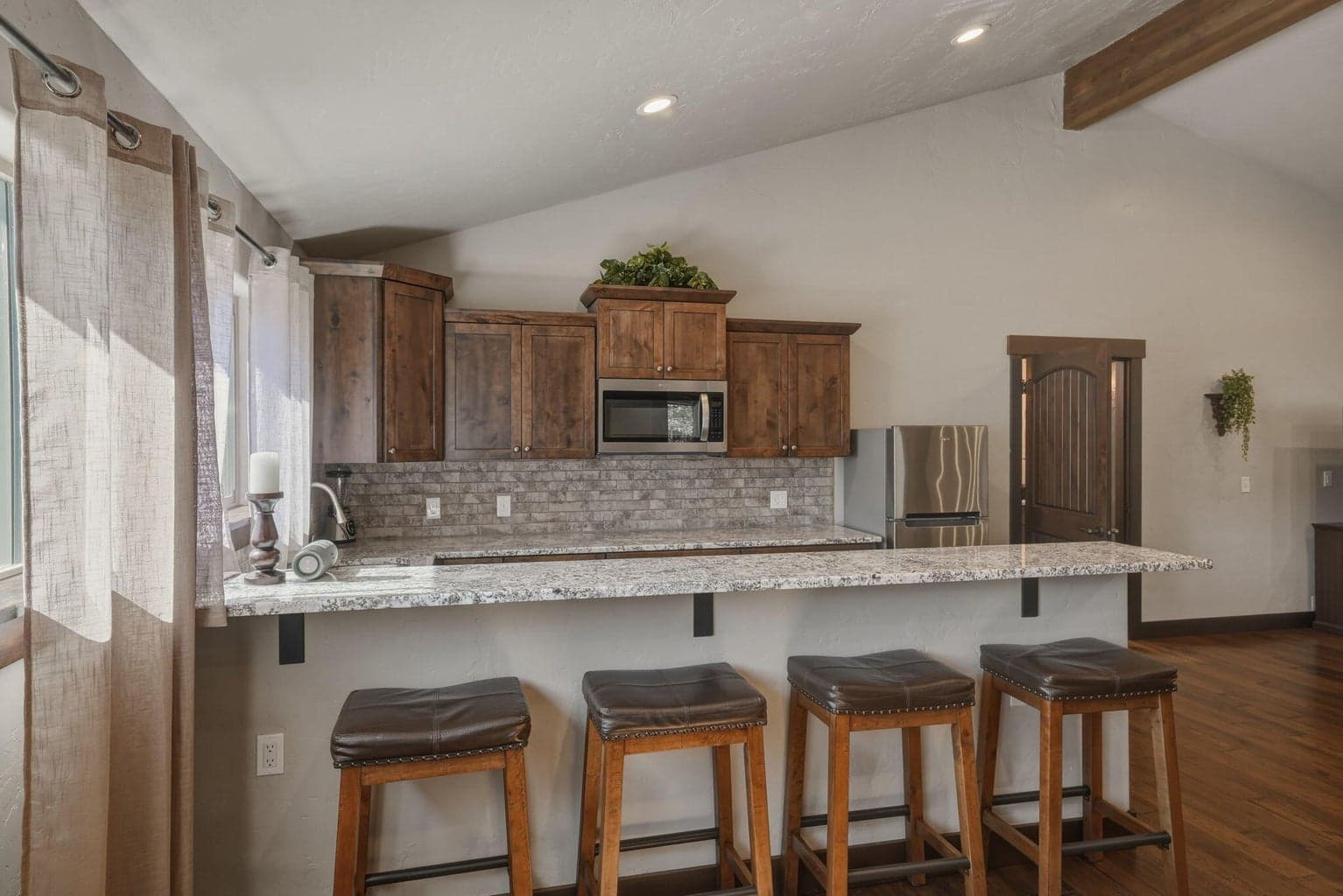"ADU" space above garage w/ separate entrance. Engineered to add walls for bedrooms & laundry room.