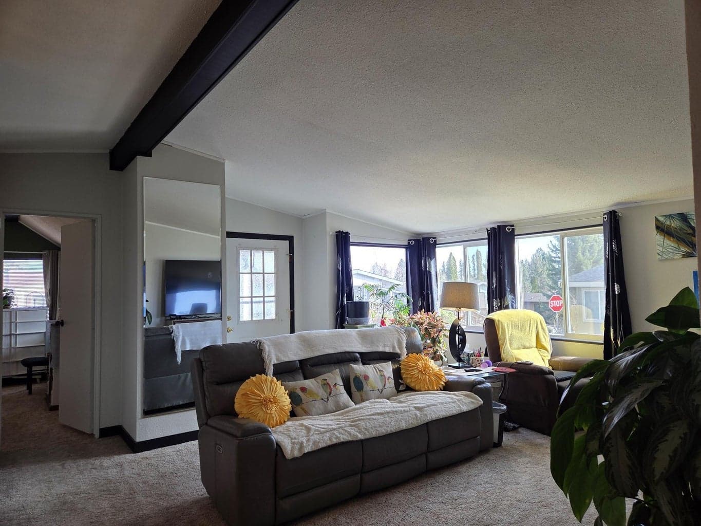 Home has new paint and new lighting and vaulted ceilings throughout.