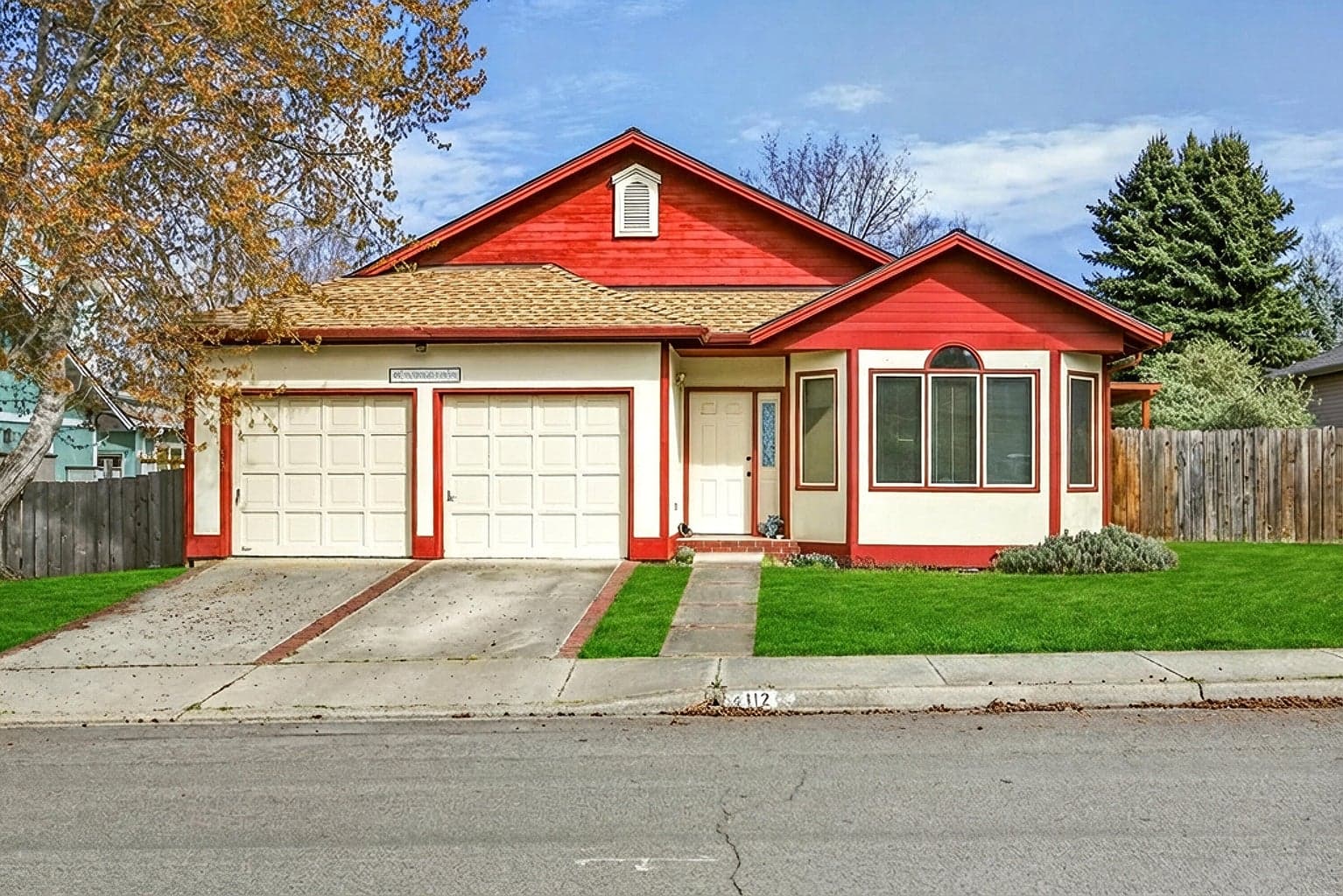 Front of home. Yard enhanced