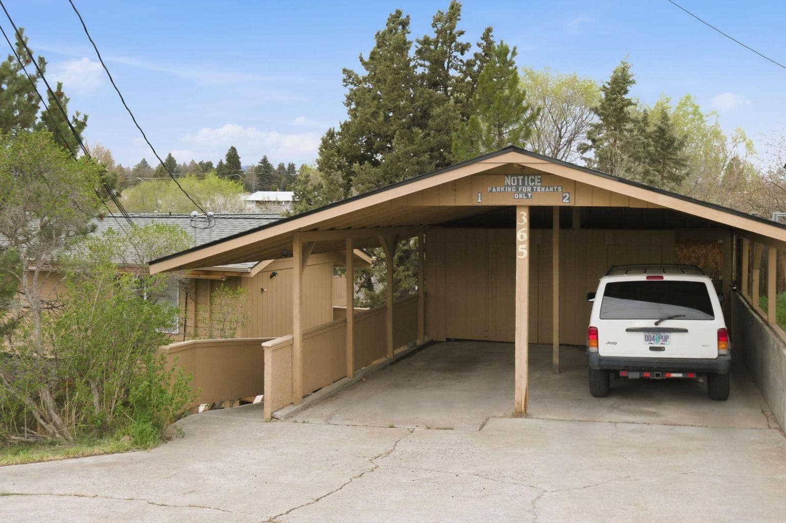 Two cover parking spots and plenty storage beyond