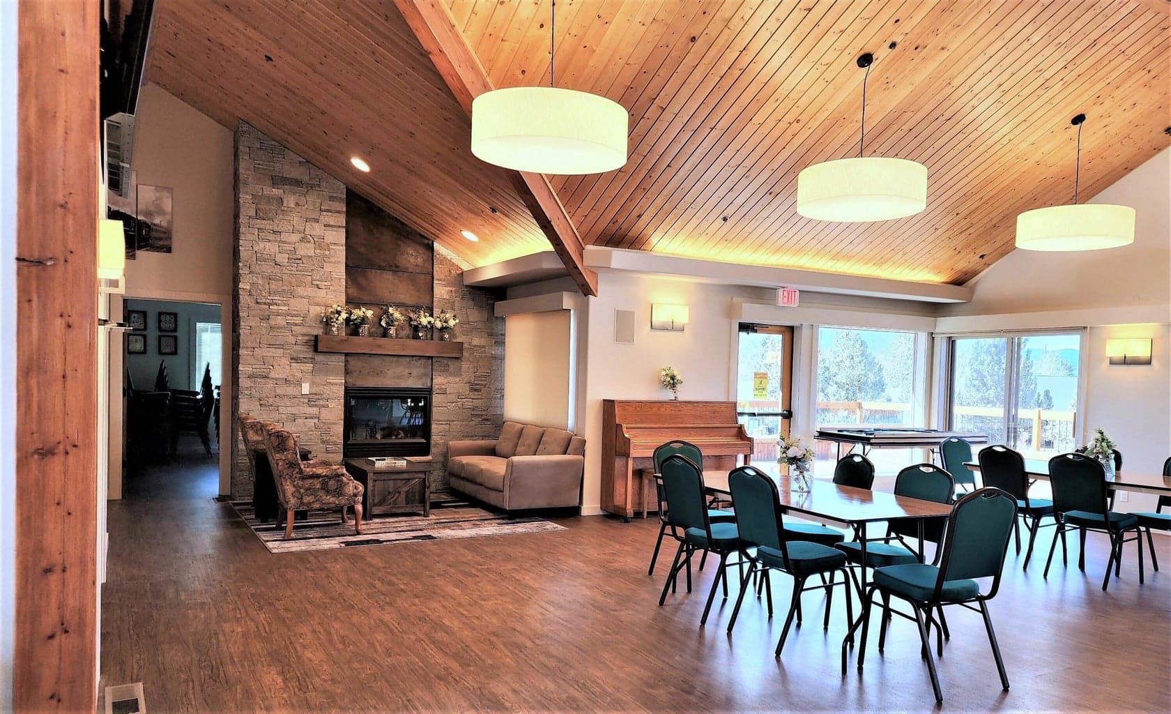 Cozy seating area by the fireplace in the clubhouse.