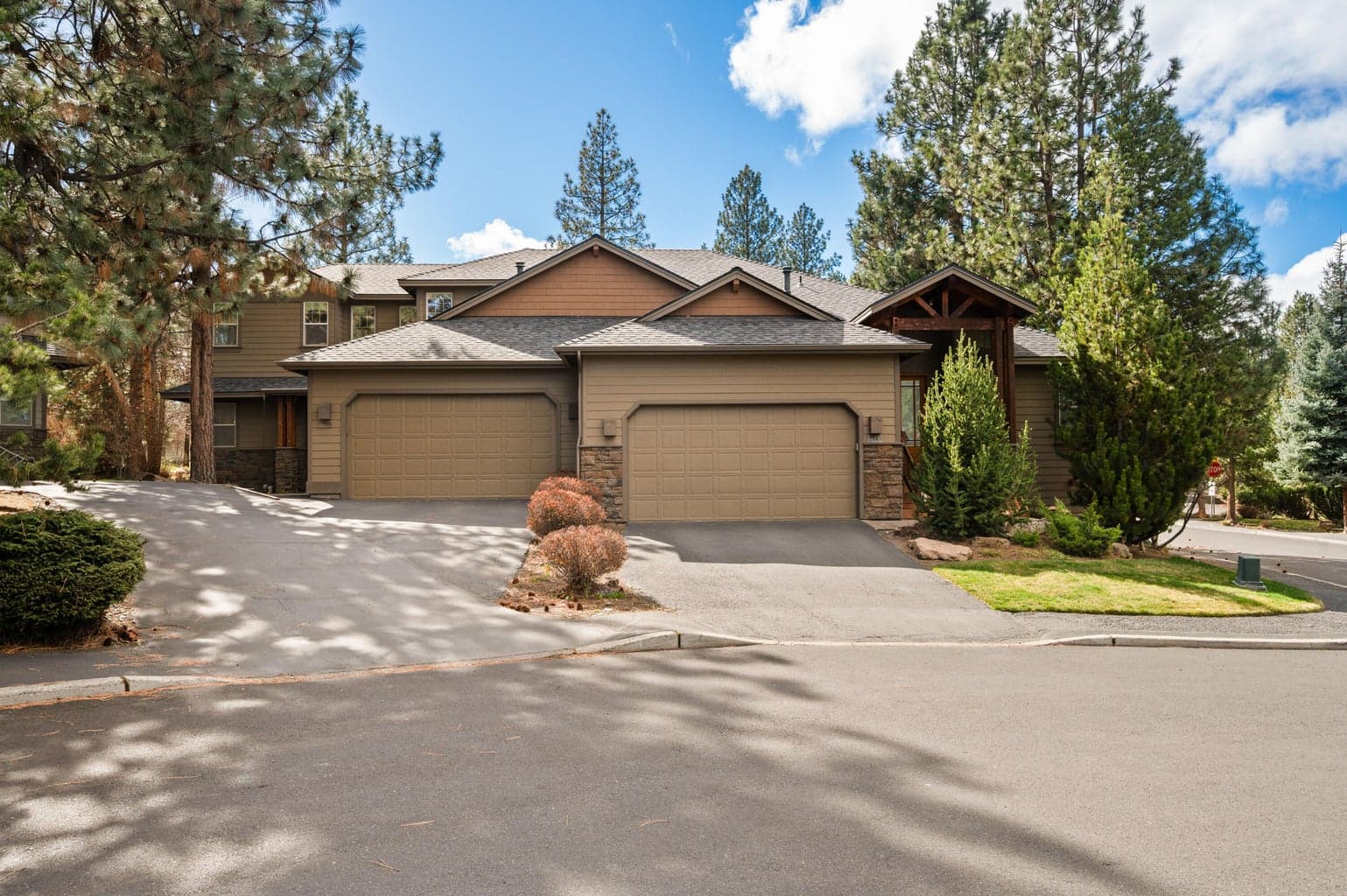 End-unit townhome offering added privacy of a natural buffer from neighboring homes lives more like a single-family residence.