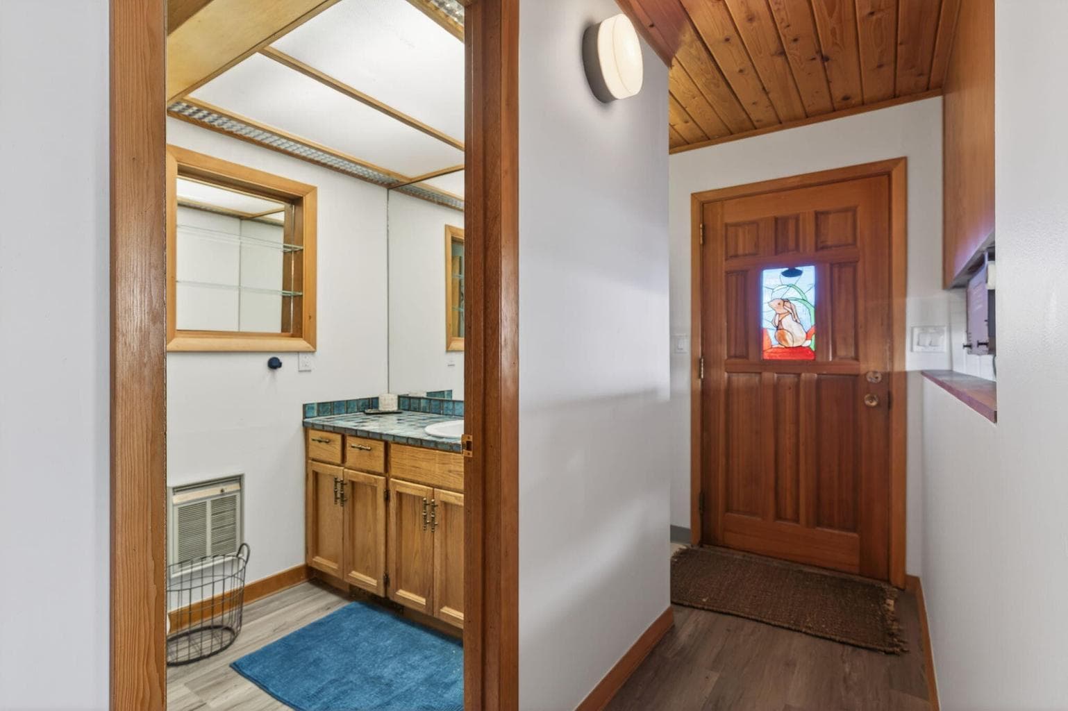 Front entry and first bathroom