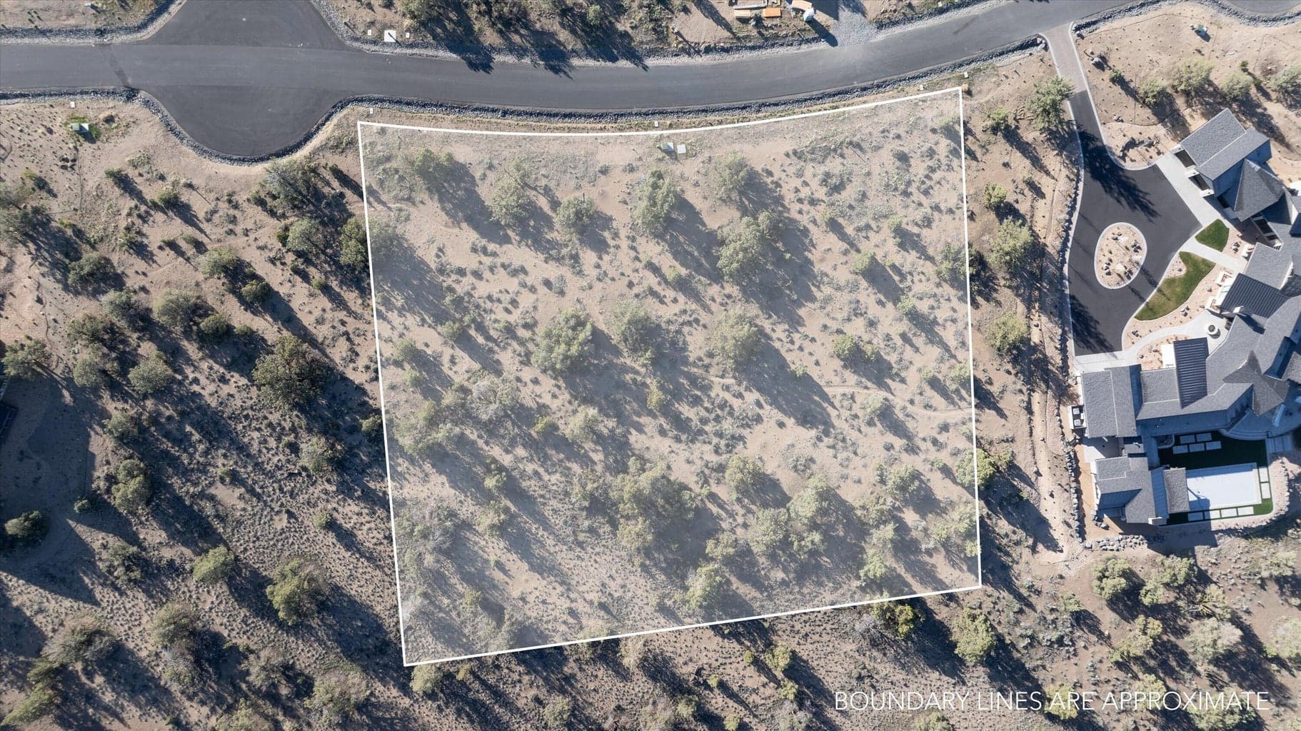 Aerial view with homesite boundaries for 1.77 acres