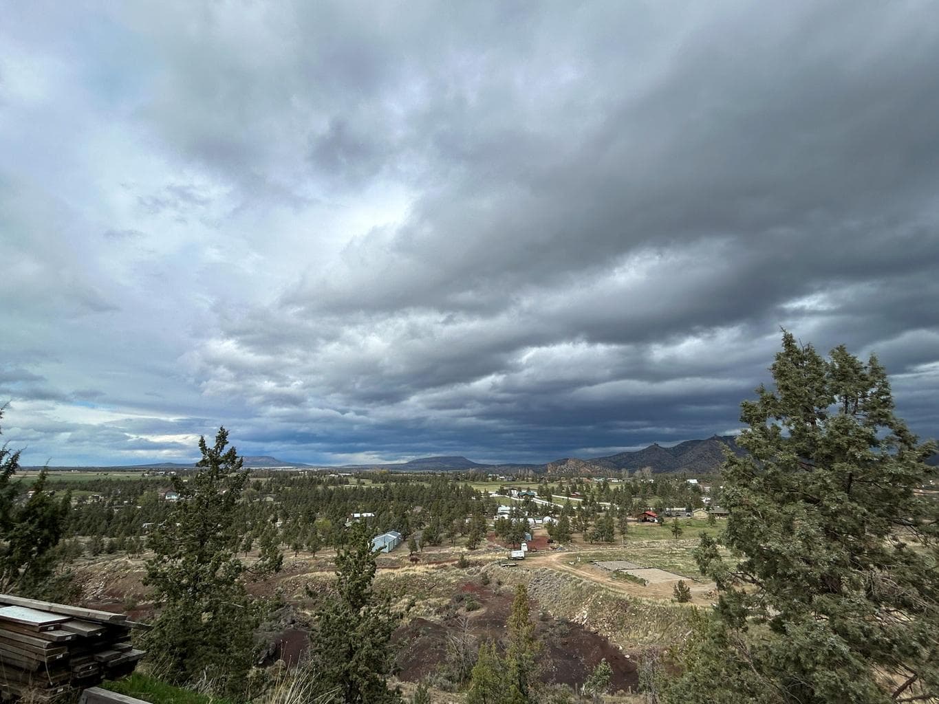 Panoramic shot from the backyard highlighting the stunning Cascade Mountain and valley views.