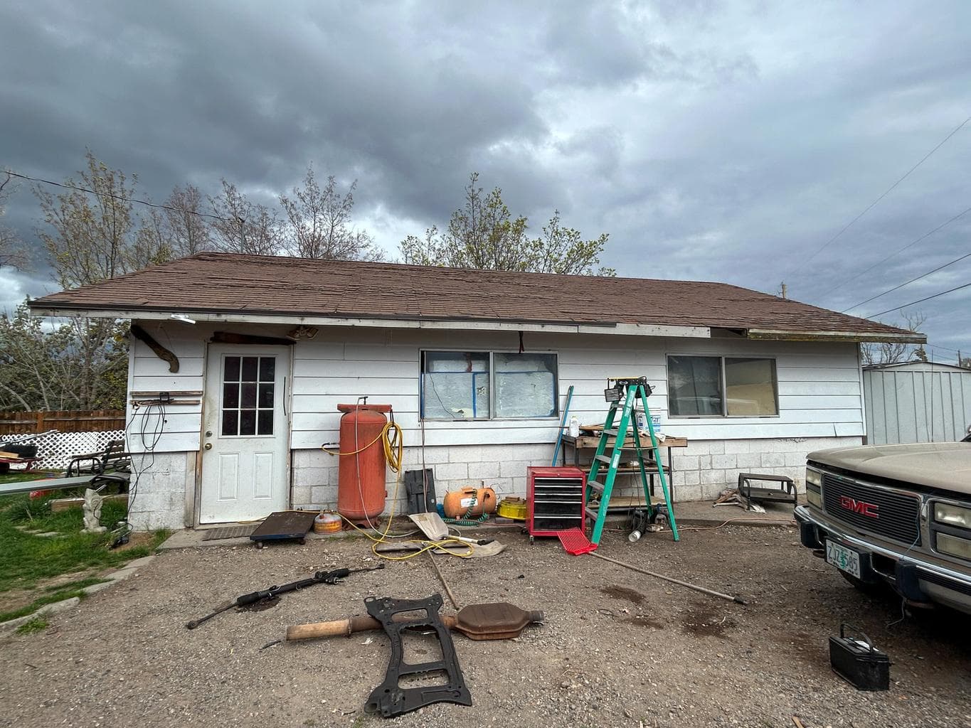 Close-up of the detached garage and shop building, perfect for projects or storage.