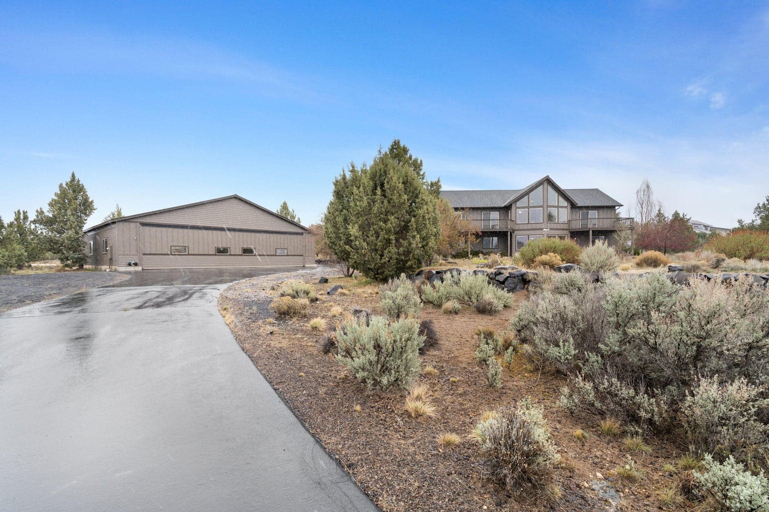 Generous driveway and easy approach to the home create a practical and inviting first impression for guests and everyday living.